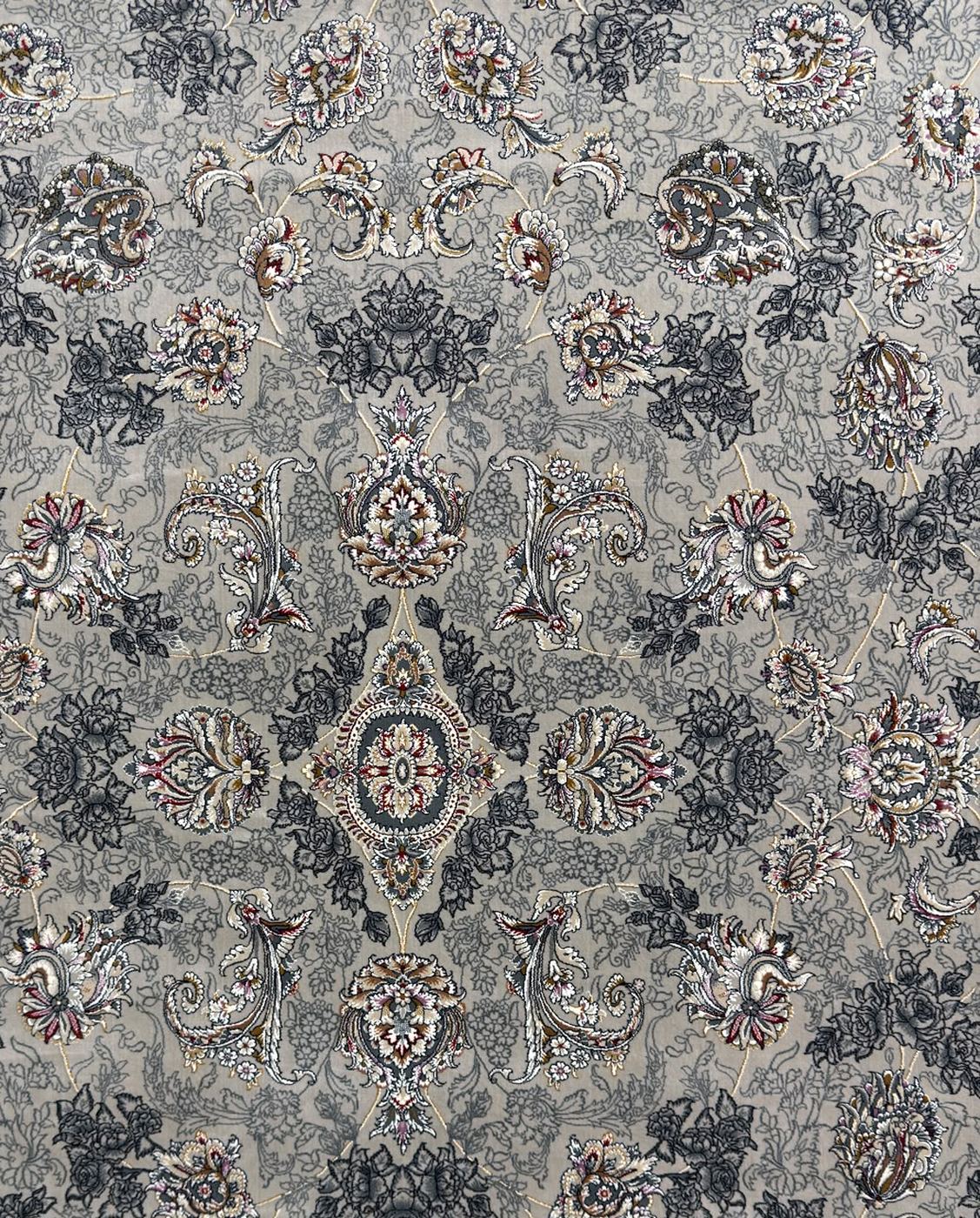 A 1200 reed Persian rug in silver grey, its medallion ringed by a finely gridded field